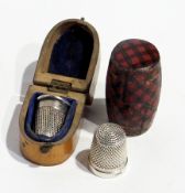 Mauchline thimble case, with another tartanware barrel-shaped thimble case, with two silver thimbles