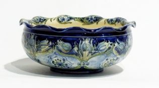 Macintyre Moorcroft Florianware bowl, circular and wavy-bordered, slip-trailed decoration of poppies