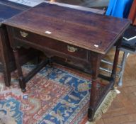 17th/18th century oak side table, rectangular top, frieze drawer with brass swan neck handles, on