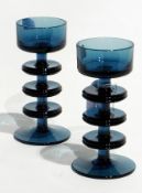 Pair of Wedgwood blue glass candlestick holders, Sheringham pattern, designed by Ronald Stennet