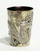 A Chinese style white metal beaker, with dragon decoration, 8.8cm high