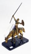 Brass statue of a knight on horseback, possibly Don Quixote, marble base, 25cm tall