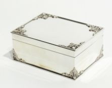 A Victorian silver cigarette box, with foliate C-scroll decoration to corners, by Charles and George