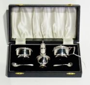 A silver five-piece cruet set, comprising:- pepper pot, mustard and open salt with blue glass liners