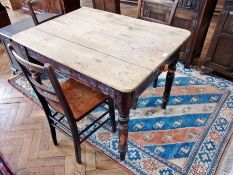 A pine rectangular kitchen table, with single frieze drawer on turned supports, 82cm wide