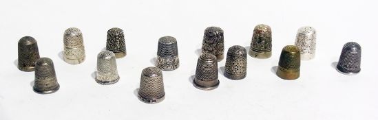 A collection of ten silver and white metal thimbles, various (11)
