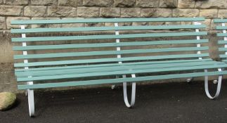 Antique bench, turquoise slats, on white cast-iron supports