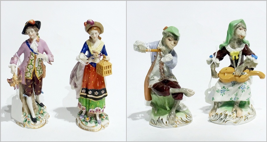 Pair Volkstedt porcelain monkey musicians, after the Meissen originals, seated and playing flute and