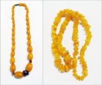 Yellow amber-type bead necklace graduated with cornelian beads and another honey-coloured rough