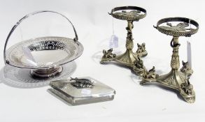 An EPNS circular bread basket, a pair of candlestick holders and other EPNS ware (5)