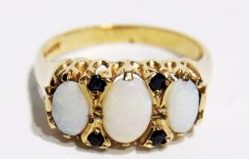 9ct gold opal and sapphire ring, set three oval opals and four small sapphires