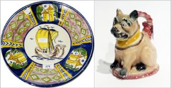 A Maiolica style plate, decorated with sailing ship and buildings, marked "M8" to reverse, 32cm in