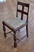 Set of four oak dining chairs, with carved cross slatback, upholstered inset seat, on turned