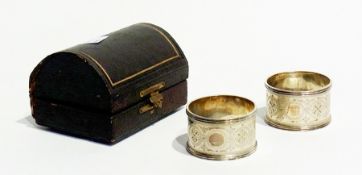 A pair Victorian silver napkin rings, with bright cut floral engravings, Sheffield 1898, within