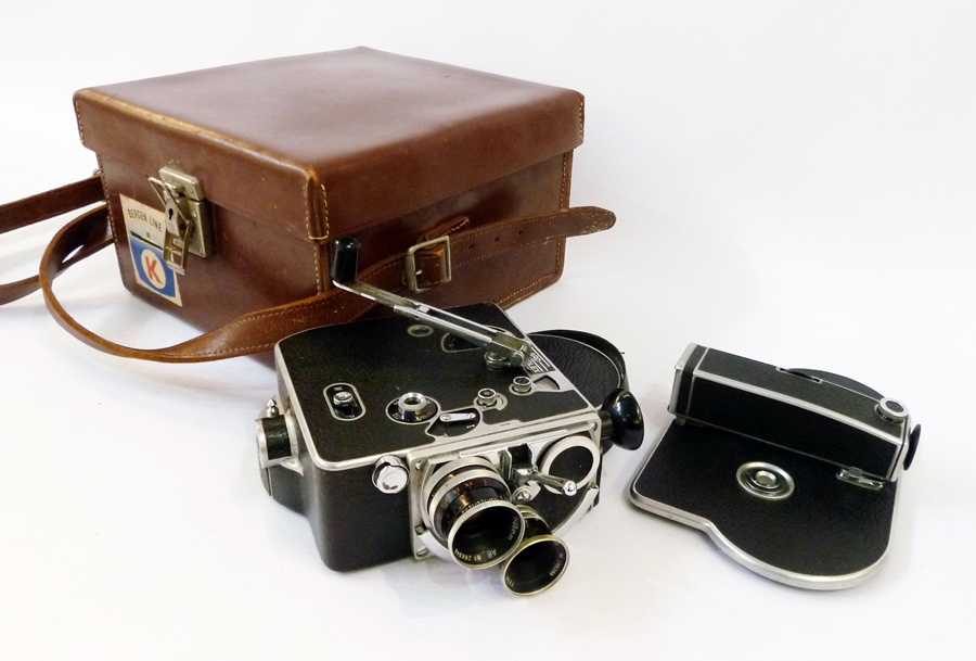 A Cased Bolex H8 Reflex Movie camera with accessories and instructions