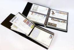 Two albums of GB FDC's and a few mint GB (2 albums)