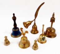 A collection of early to mid twentieth century brass bells, various, to include:- handbells, table