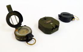 Military compass GEC No 8 135853 in black japanned case, Kalart compass and another (3)