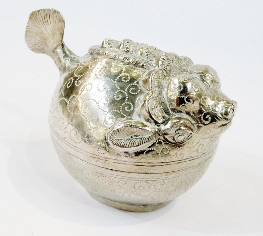 An Eastern silver-coloured metal fish-shaped oval box and cover, length 10cm