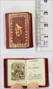 "Petit Fabuliste" 
pub. Firmin Didot, Paris, miniature book (approx. 3cm x 2cm), inscription to