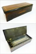 Late 19th century/ early 20th century cylinder musical box, having 33cm brass cylinder and steel