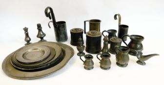 A quantity of pewter to include:- measures, ice cream and dessert moulds, salt and pepper pots,