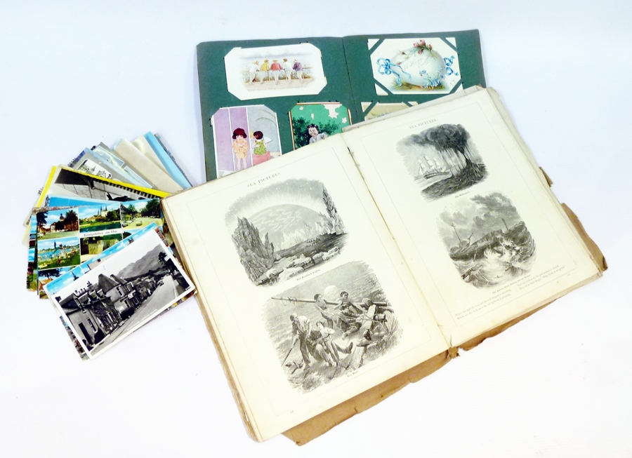 An album containing various late 20th century postcards, some loose, and "The Picture Scrapbook