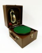 "Trench" portable gramophone,  of transitional type with integral horn in hinged lid, with wind-up