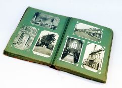 Album containing assortment of mid to late 20th century postcards