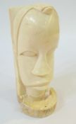 An African carved ivory bust, 17cm high (af)