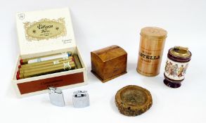 A collection of Castella cigars and others, a walnut cigarette holder, three lighters and an ashtray