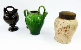 A half-glazed pottery jar with the Royal Coat of Arms and a tin cover, together with a green