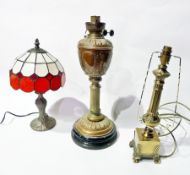 Victorian brass oil lamp, brass table lamp with ornate column and a Tiffany-style table lamp