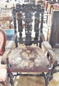 Antique continental carved oak carver with carved panel back, foliate  decorated, with floral