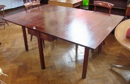 19th century mahogany drop-leaf dining table, rectangular on wave-mould straight supports opening to