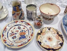 A Higginbotham "Amherst Japan" Imari-style plate, another smaller plate, a McIntyre jug, a two-