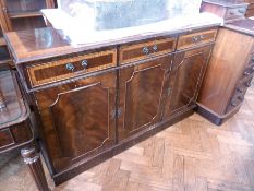 A modern mahogany sideboard, with three drawers above with two cupboards below, on plinth base,