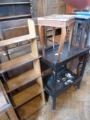 An early 20th century oak two-tier trolley, a modern free-standing bookcase, an inlaid sewing