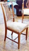 Set of four early 20th century mahogany dining chairs, with pierced slat back, light green