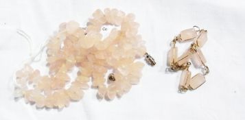 A rose quartz beaded necklace and a rose quartz bracelet (2)