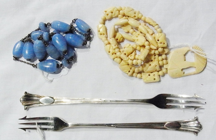 Pair Victorian silver pickle forks, with scroll handles, Sheffield, 1900 and a vintage blue glass