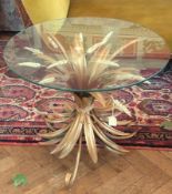 A modern wheat sheaf circular occasional table, glass top with gilt metal wheat sheaf base, 60cm