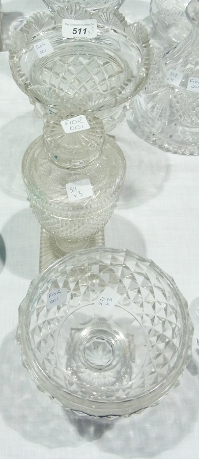 A clear cut glass pedestal bowl, another with flared rim and a pedestal jar with cover (3)