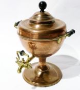 Copper samovar with brass handles and spout on circular foot