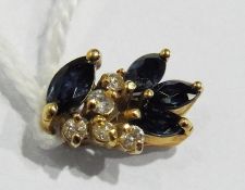 Gold, sapphire and diamond pendant with four elliptical sapphires and five small diamonds