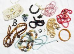 A beaded purse and a quantity of assorted beaded necklaces (1 box)