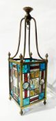 19th century brass leaded and stained glass hanging lantern, having scroll supports to the square