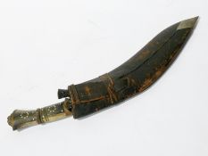 Eastern inlaid horn handled kukri, two smaller knives and leather scabbard