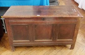 Antique oak coffer with double plank top with quadrant-mould edge, triple framed moulded panel front