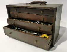 Portable travelling oak chest of toolmaker's tools, having framed panel removable front, four